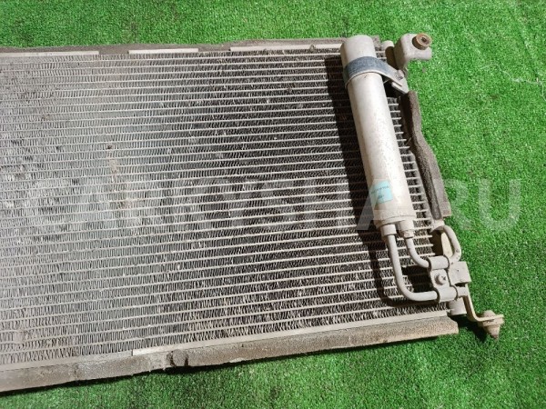 Радиатор кондиционера (конденсер) Mitsubishi Lancer оригинальный номер MN134204