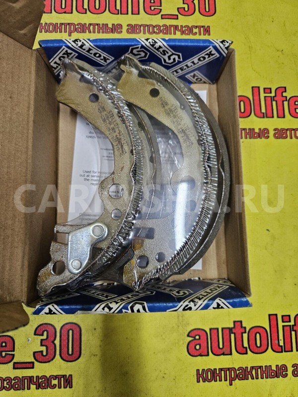 Колодки тормозные Nissan Micra оригинальный номер 44060AX026