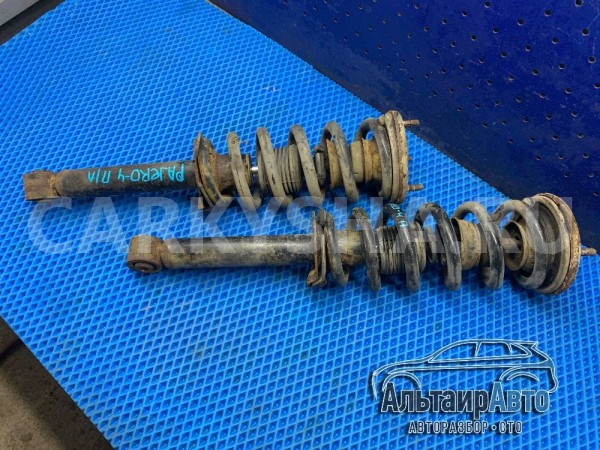 Mitsubishi Pajero 4 амортизатор передний стойка Mitsubishi i оригинальный номер 4062A024