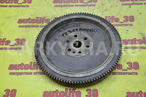 Маховик Nissan Micra оригинальный номер 12311BX000