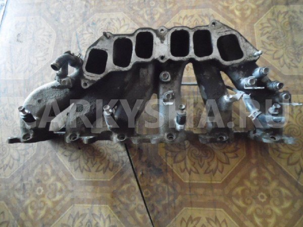 Впускной коллектор Land Cruiser 100 1FZ-FE низ Toyota Land Cruiser оригинальный номер 1711166040