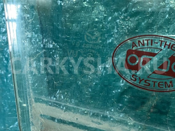 Стекло двери передней правой Mazda CX-7 I 06—2009 Mazda 2 оригинальный номер EG2158510