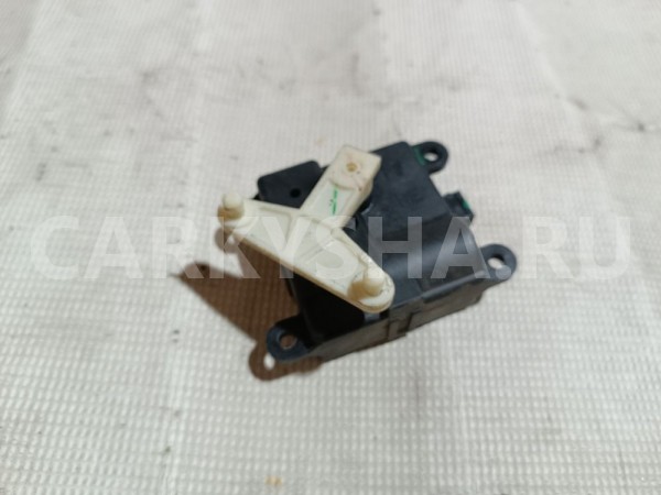Моторчик заслонки отопителя Nissan Almera Classic оригинальный номер 3027030820