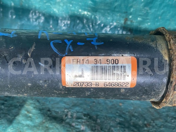 Амортизатор передний левый Mazda CX-7 I Mazda 2 оригинальный номер EH1434900