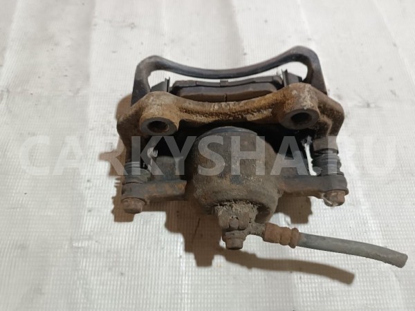 Суппорт тормозной передний левый Nissan Almera Classic оригинальный номер 4101195F0A