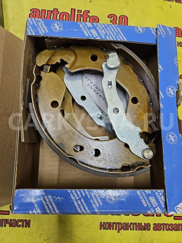 Колодки тормозные Nissan Micra оригинальный номер D4060AX601