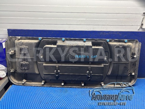 Обшивка багажника Pajero 4 органайзер Mitsubishi i оригинальный номер 7225A030XA